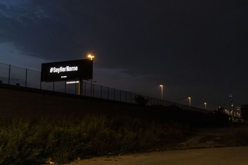 A digital billboard along the Dan Ryan Expressway with “#SayHerName” written on it in between ads near35th and LaSalle, Thursday, Sept. 24, 2020. The hashtag refers to the fatal Louisville, Kentucky, shooting of Breonna Taylor and the Black Lives Matter movement.