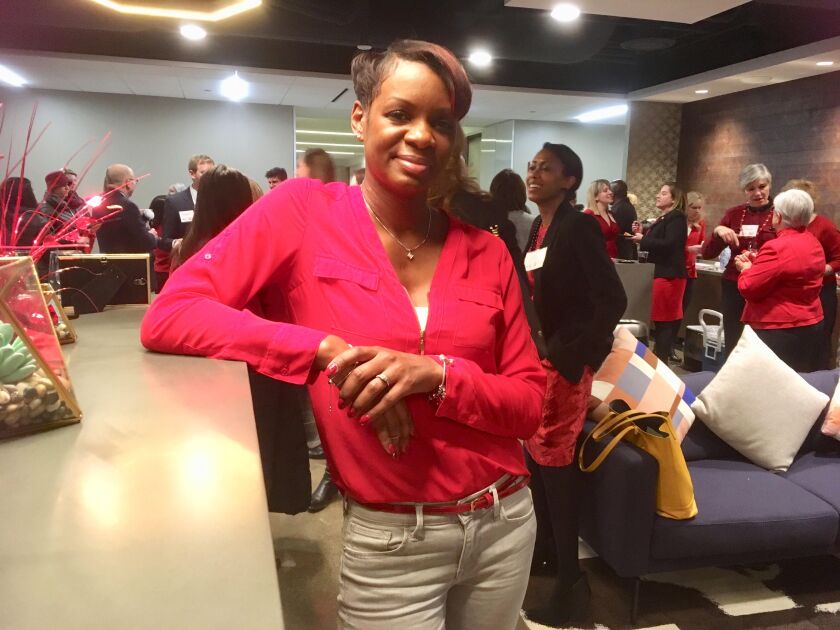 Tammika Glass, who’s nickname is “Niki,” celebrates her “heart birthday” at a Feb. 1 kickoff event for National Heart Awareness Month. | Maudlyne Ihejirika/Sun-Times