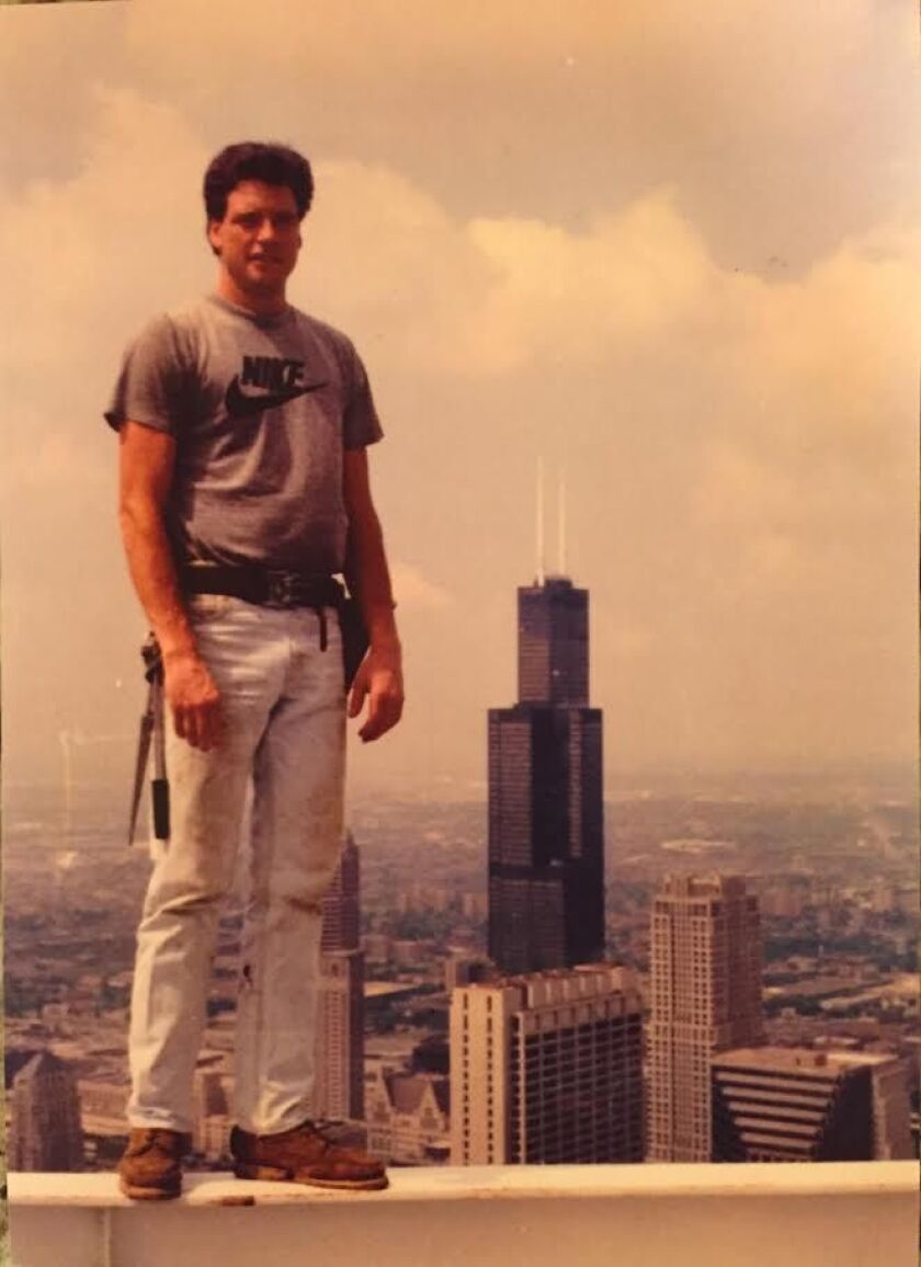 As an ironworker, Tommy Gardiner got a bird’s-eye view of Chicago’s sights. In this photo shot by a coworker and provided by his family, he’s seen in the early 1990s atop what’s now called the Aon Center during a repair job.