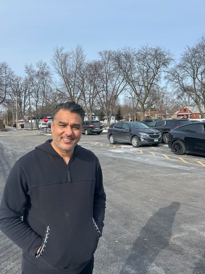 Shiraz Najam poses for a photo after voting.