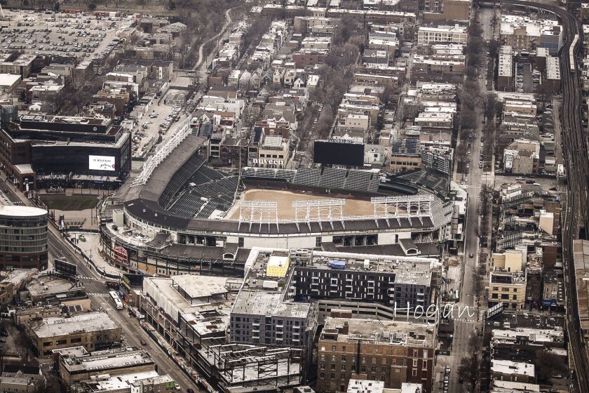 This aerial view shows Wrigley Field and construction of the Addison & Clark project as of March 29. | Lee Hogan / Sun-Times