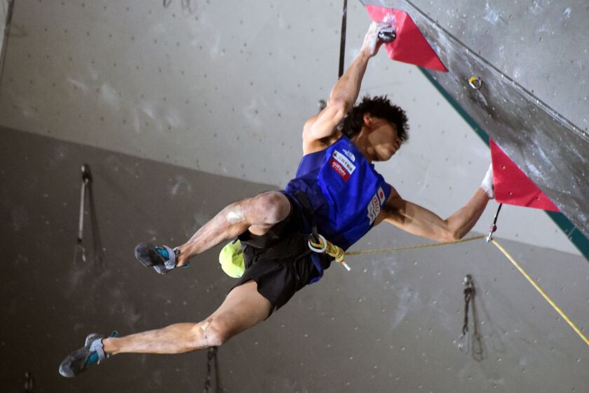 Japanese climber Kokoro Fujii shows how important the hands are to the sport, which will have three types of competitions in the Tokyo Olympics.