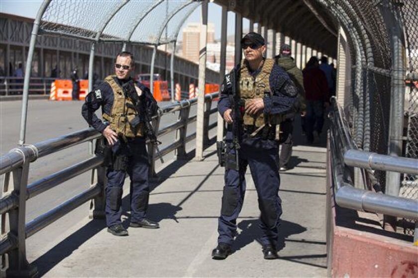 U.S. Customs and Border Protection officers of the Special Response Team unit patrol on the Paso del Norte Port of Entry in El Paso, on Tuesday. | Ivan Pierre Aguirre/AP