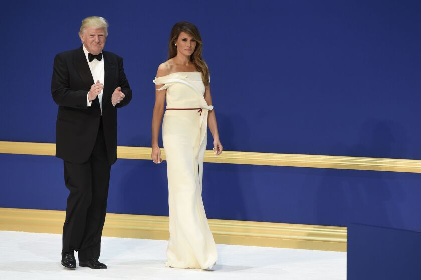 President Donald Trump and First Lady Melania Trump during the Salute to Our Armed Services Inaugural Ball at the National Building Museum in Washington, DC, January 20, 2017. | SAUL LOEB/AFP/Getty Images)