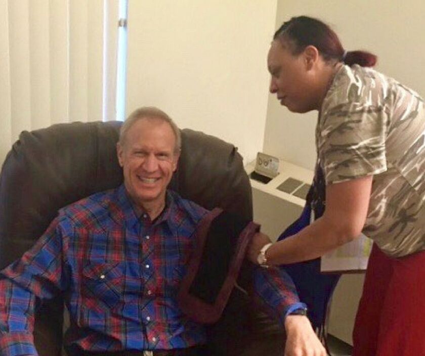 Gov. Bruce Rauner has his blood pressure checked at the veterans home in Quincy. | Facebook