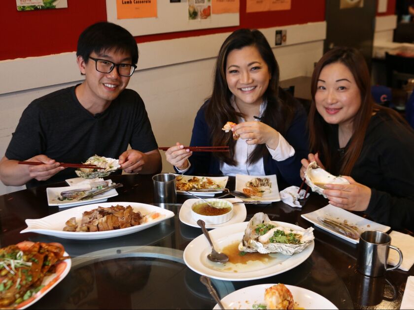 Manager Milo Chan and Chef Wendy Cheung with Ji Suk Yi at Go 4 Food. | Brian Rich/Sun-Times