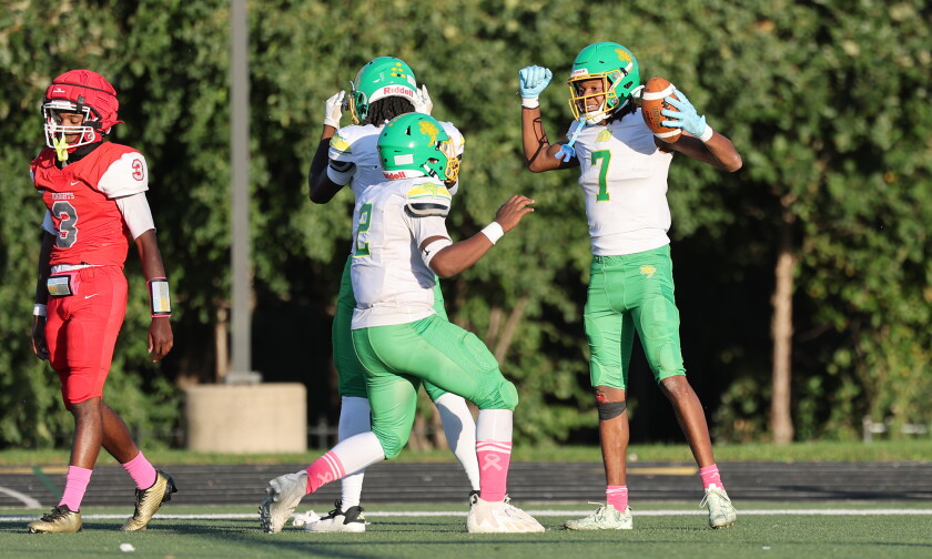 Ag. Science's Tyrell Brownlow (2) helps Taylor Johnson (7) celebrate his touchdown during the Cyclones 31-24 victory over Goode.