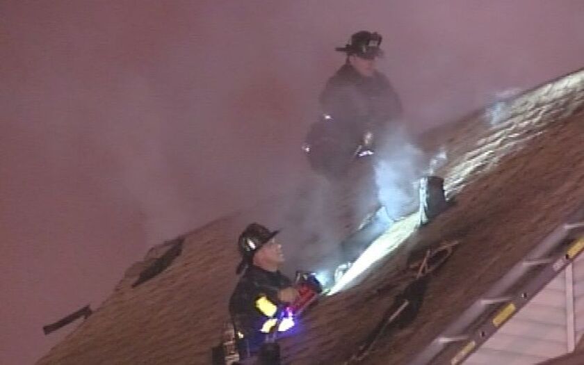Firefighters battle a Northwest Side apartment fire late Friday. | Network Video Productions
