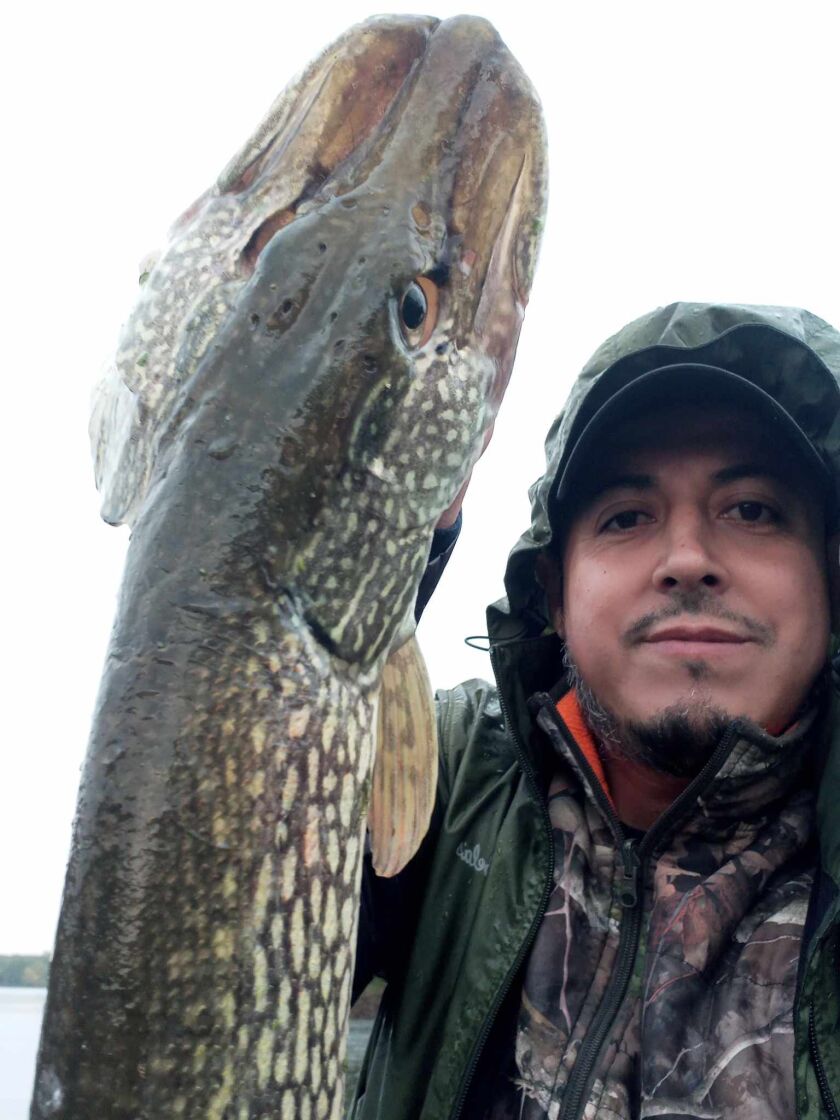 Juan Macias with a northern pike from Busse Woods. Provided photo