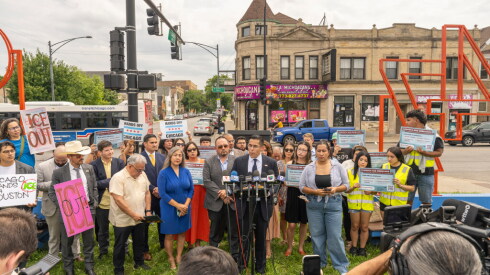 Berto Aguayo, co-chair of the Latino Leadership Council speaks to reporters during a press conference to denounce an increase of ICE activity in the area. The news conference was held at 47th Street and Damen Avenue in Back of the Yards.