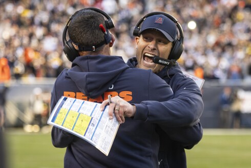 Bears head coach Ben Johnson hugs defensive coordinator Dennis Allen after the Bears took possession of the ball at the end of the fourth quarter against the Pittsburgh Steelers at Soldier Field, Sunday, Nov. 23, 2025.