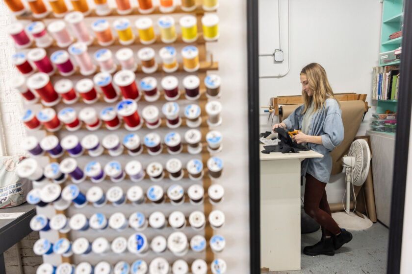 Students make aprons from patterns provided at Lillstreet Art Center in Ravenswood. Since the pandemic, the number of people signing up for sewing classes has been on the rise.