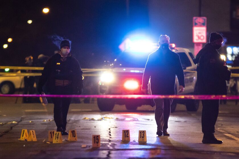 Police investigate a shooting inside an IHOP restaurant Saturday night in Evanston that left a woman critically wounded. The gunman was later killed by officers during a gun battle in a nearby parking lot.