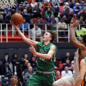 York’s Nathan Shockey (10) looks to score ahead of Whitney Young’s Tyler Beard (24) in their 58-56 loss in Hillside, Wednesday, March 6, 2019. | Kevin Tanaka/For the Sun Times