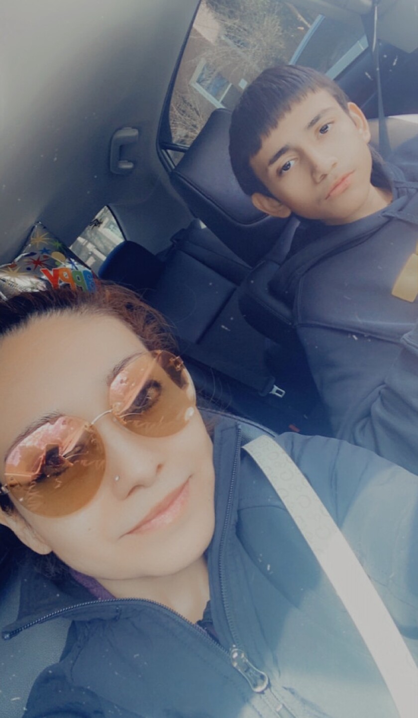 Elizabeth Toledo and her son Adam are pictured in this family photo.