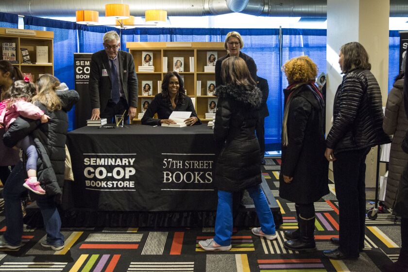 Michelle Obama meets fans in Chicago as her national book tour kicked off Tuesday, Nov. 13, 2018, at Seminary Co-op Bookstore in Hyde Park. (Ashlee Rezin/Chicago Sun-Times)