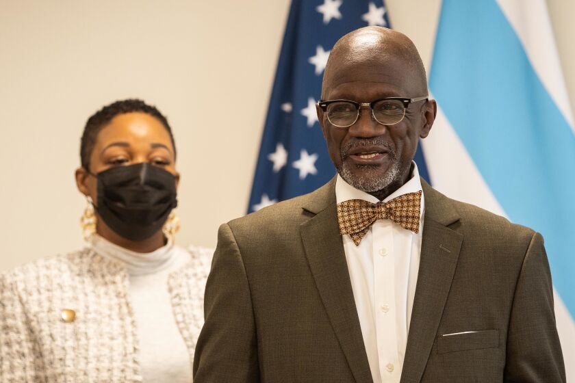 Roosevelt Long, the brother of Betty Jean Howard, a teacher killed in 2014 by a stray bullet, speaks during the opening of the Chatham Education and Workforce Center in the Chatham neighborhood.