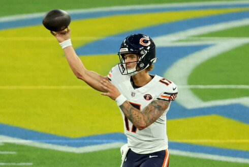 A photo of Bears quarterback Tyson Bagent throwing a pass against the Chargers.