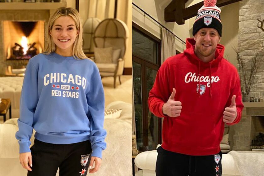 Soccer player Kealia Ohai, traded from the Houston Dash to the Chicago Red Stars, sports some new Red Stars merchandise. So does her fiancé (right).