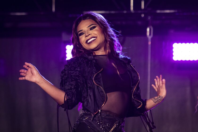 Vanessa Vanjie Mateo entertains the crowd during Drive ‘N Drag on Friday night.