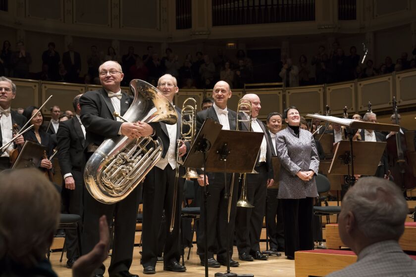 Composer Jennifer Higdon and the CSO Low Brass section acknowledge the audience’s warm reception following the world premiere performance of her “Low Brass Concerto” Thursday night at Symphony Center.<br>| © Todd Rosenberg 2018