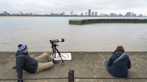 A crowd of bird watchers have gathered for days at the Montrose Point Bird Sanctuary to observed a pair of snowy owls. The park district asked visitors to keep 300 feet away from the owls for their safety.