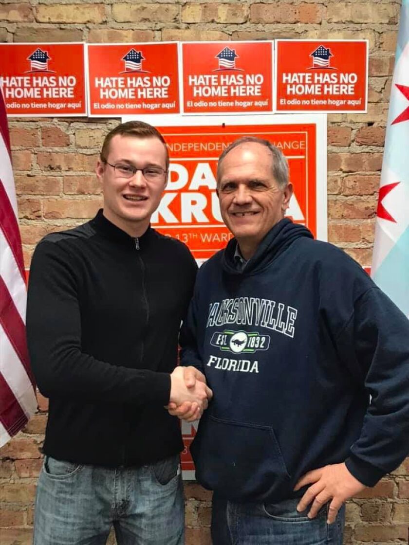 David Krupa, left, shakes hands with David Shestokas of The Heartland Institute.