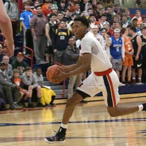 St. Rita’s Jeremiah Oden (25) run the court after getting a steal against Bro. Rice Tuesday 12-04-18 Robinson/For Sun-Times