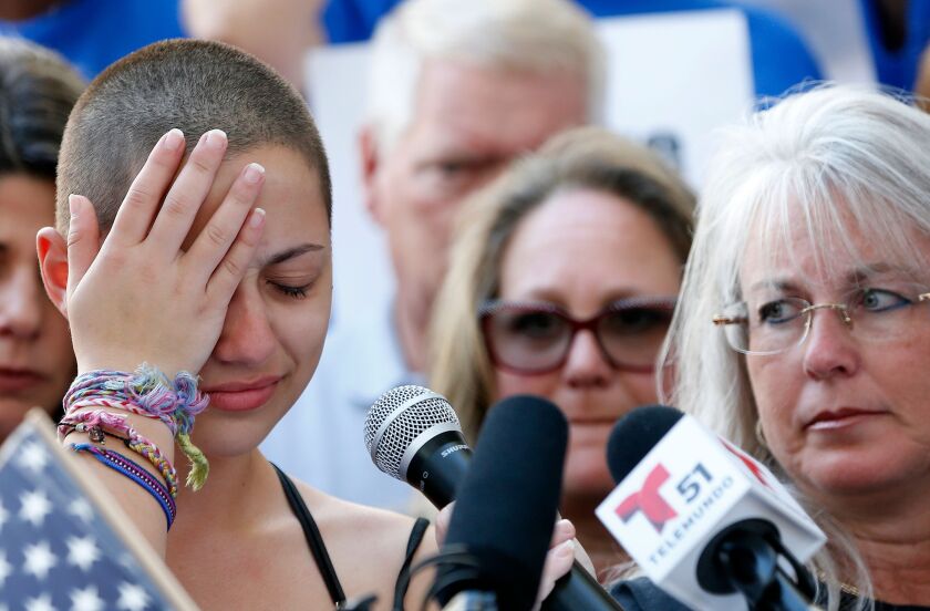 Marjory Stoneman Douglas High School student Emma Gonzalez spoke at a rally for gun control at the Broward County Federal Courthouse in Fort Lauderdale. She called out President Donald Trump on Saturday over his ties to the National Rifle Association and