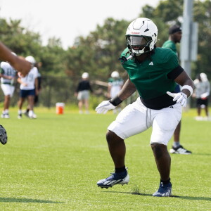 CSU football players practice Wednesday on Chicago State University’s campus in Roseland.