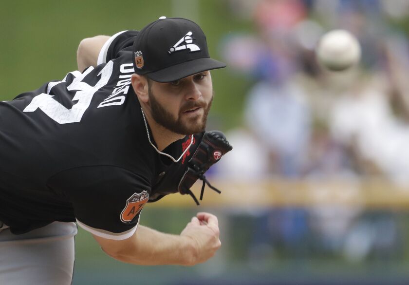Lucas Giolito delivers a pitch in the first inning.