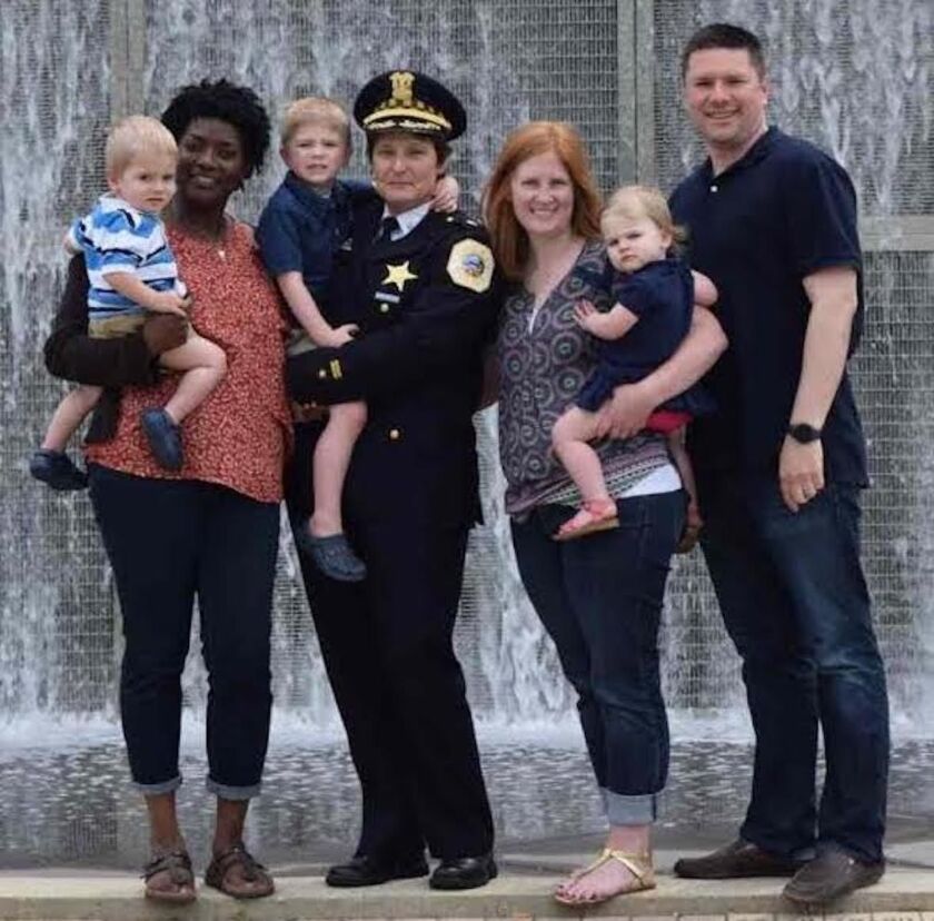 Johanne M. Kenol and her wife Nancy Lipman (center) with Lipman’s son Christopher and wife Diana and their three children.