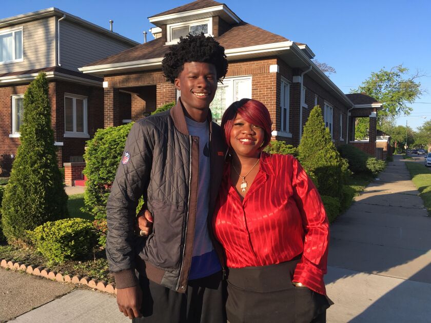 Delores Bailey with son Demacio Bailey, whose twin brother Demario was shot and killed in December 2014 after some boys robbed them and Demario tried to protect his brother. | Maudlyne Ihejirika/Sun-Times