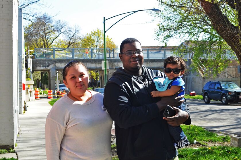 <small><strong>Maria Pushcmann, Quentin Carwell and their son, Jackson — with the Bloomingdale Trail in background. | Mitch Dudek/Sun-Times</strong></small>