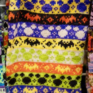 Knitted cowls are on display during the 19th YarnCon at the Plumbers Union Hall in the Near West Side on Saturday.