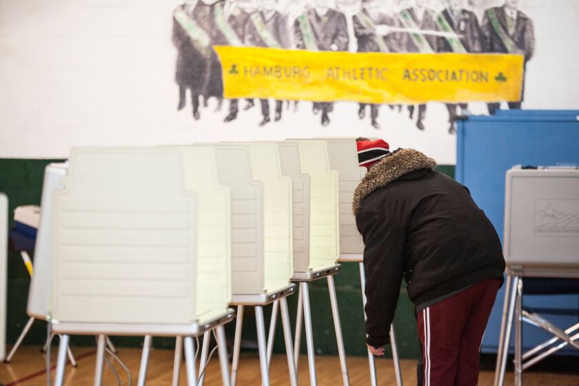 Voters cast their ballots in the municipal elections at the Hamburg Athletic Association in Bridgeport, Tuesday, February 24th. | James Foster / for Sun-Times Media