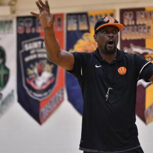 Leo coach Shawn Frison gives directions. Worsom Robinson/For the Sun-Times.