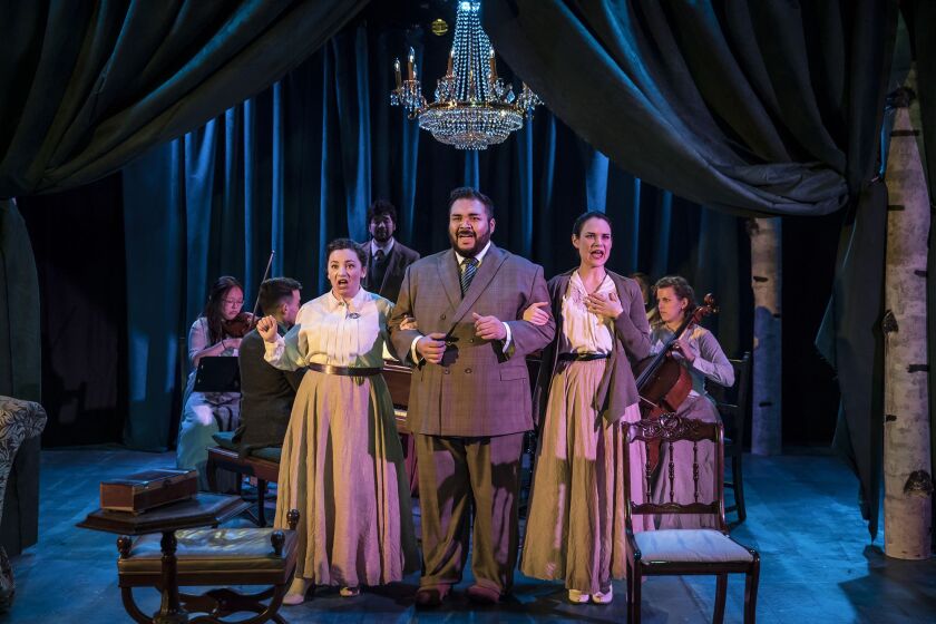 Rachel Klippel (from left), Lazaro Estrada and Emily Goldberg in a scene from BoHo Theatre’s production of “A Little Night Music.” | Liz Lauren