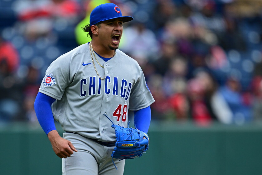 Cubs relief pitcher Daniel Palencia celebrates after the Cubs defeated the Guardians on April 5.