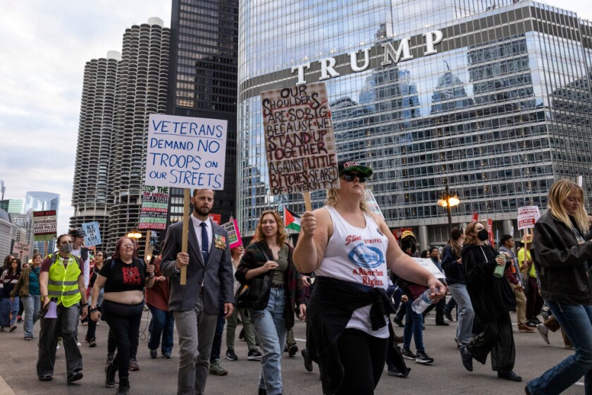 Protesters march through the Loop, rallying against threats from the Trump administration to increase ICE raids and send the federalized National Guard to the city of Chicago, Saturday, Sept. 6, 2025.