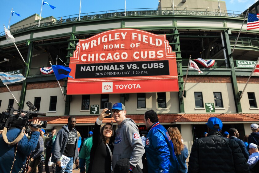 Fans outside Wrigley Field on Thursday before opening day on Thursday.