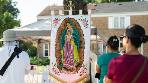 An image of the Virgin Mary hangs on a tree during a mass and memorial commemorating the one-year anniversary of the killing of Silverio Villegas González at the intersection of Grand Avenue and Emerson Street in Franklin Park, Ill., Saturday, Sept. 12, 2026.