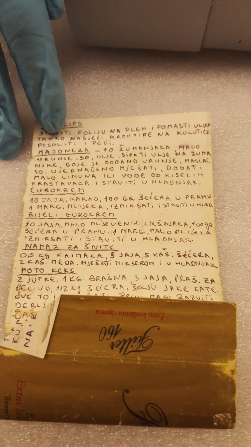A series of handwritten recipes utilizing paper from cigarette boxes were lifesaving therapy for concentration camp prisoner Misrad Causevic during the Bosnian war in the 1990s. They are among the mementos donated to to the Illinois Holocaust Museum and E