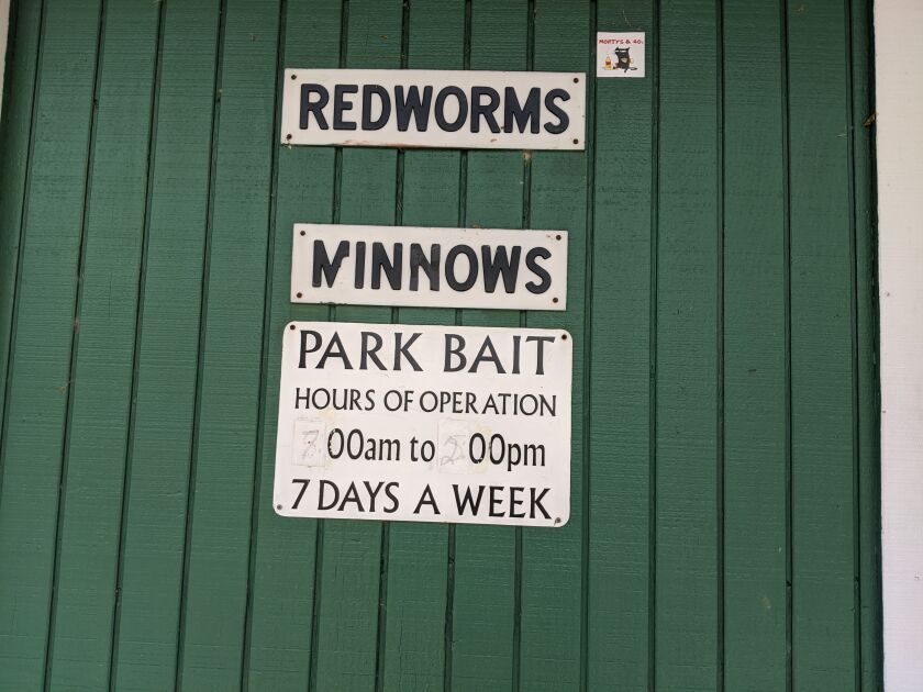 A cryptic sign hangs on the door of the closed Park Bait at Montrose Harbor. Credit: Dale Bowman