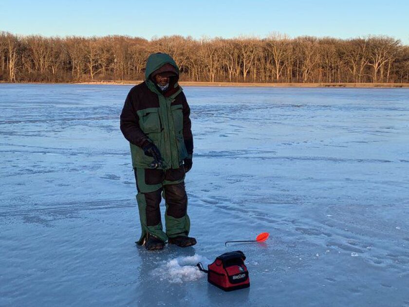 Larry Green sent his last ice fishing of the season. Credit: Andy Hansen