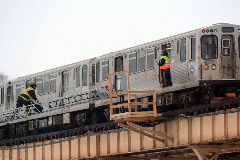 <small><strong>Firefighters responded on Tuesday morning to 37th and State streets, where passengers had to be moved from a stalled Green Line train. Another train had to back down the tracks to transfer and take the 27 passengers to their destinations. |