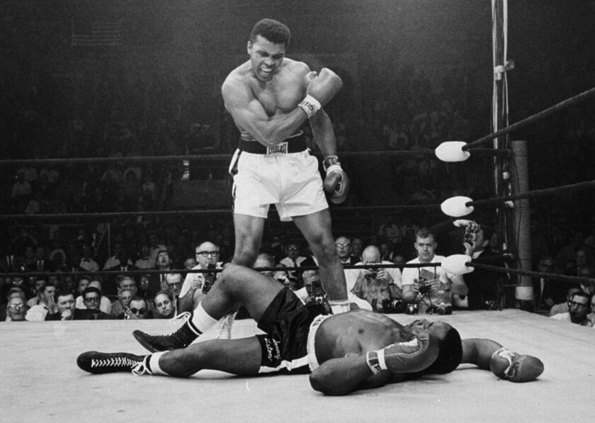 Muhammad Ali, seen here in 1965 after dropping Sonny Liston, is mentioned in FBI files concerning his connection to the Nation of Islam and his opposition to the military draft.