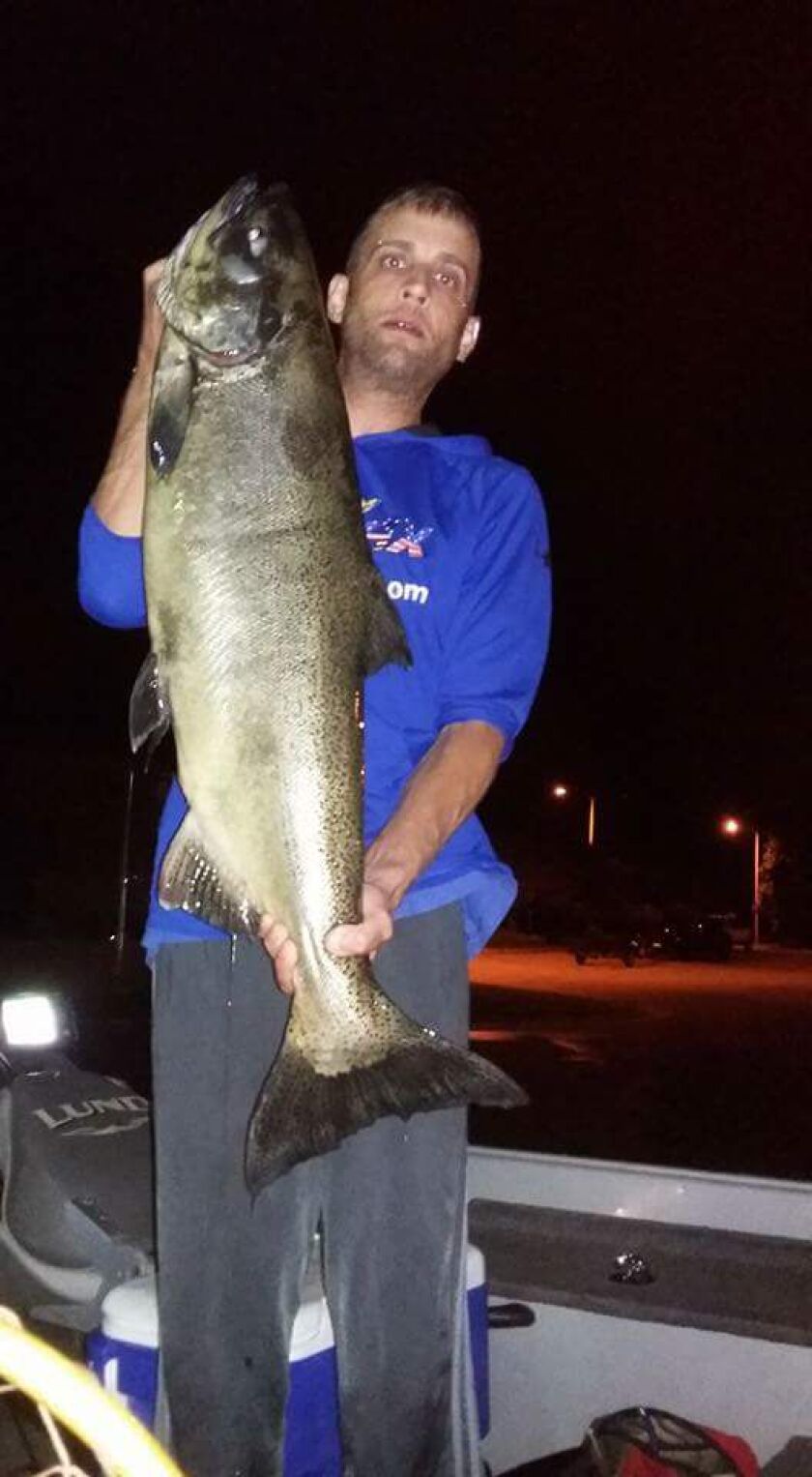 Mike Ocho with a Wisconsin king.<br>Provided