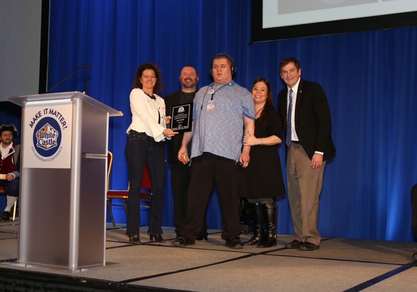 Chicagoan Noah Martin (center) is inducted into the White Castle “Cravers Hall of Fame” on Feb. 19, 2019. | Courtesy White Castle