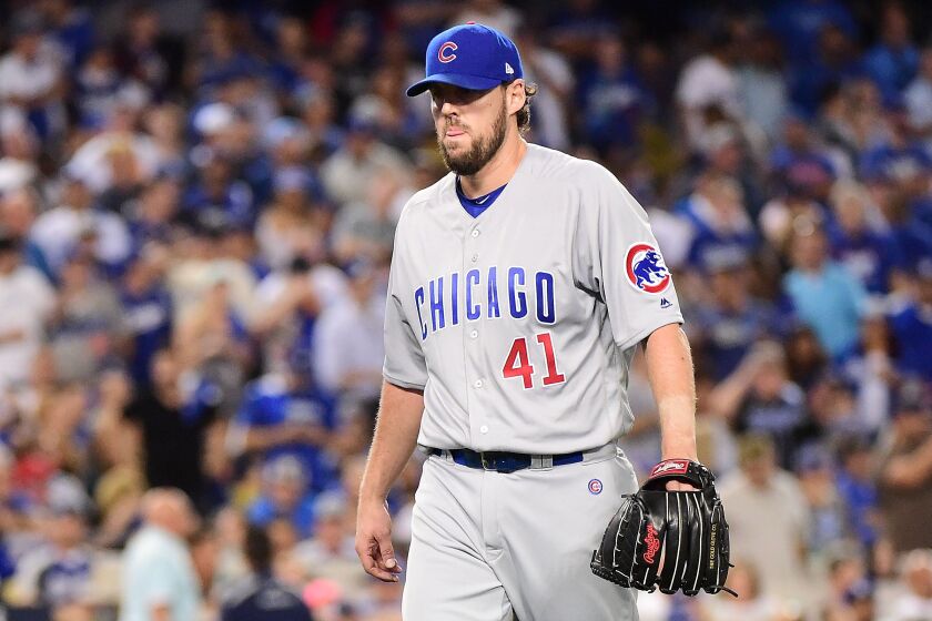 <em>John Lackey walks off the mound after being taken out of the game. (Photo by Harry How/Getty Images)</em>